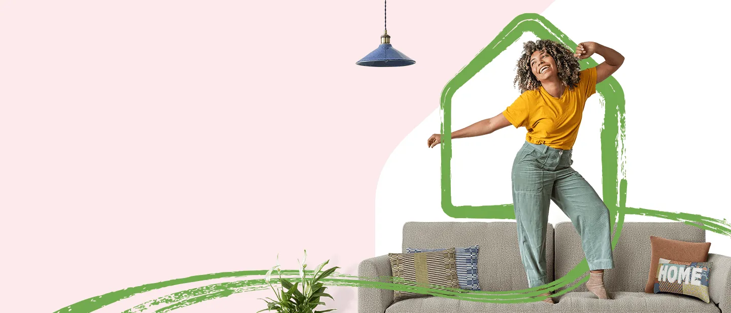 illustration featuring a smiling woman in a yellow shirt and green trousers joyfully dancing on a grey couch, enclosed within a green hand-drawn house icon outline.